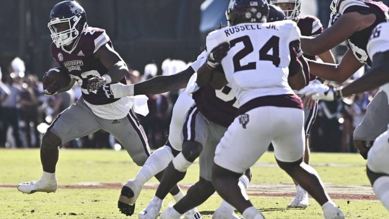 Oct 1, 2022; Starkville, Mississippi, USA;  Mississippi State Bulldogs running back Dillon Johnson (23) runs the ball against the Texas A&M Aggies during the second quarter at Davis Wade Stadium at Scott Field. Mandatory Credit: Matt Bush-USA TODAY Sports