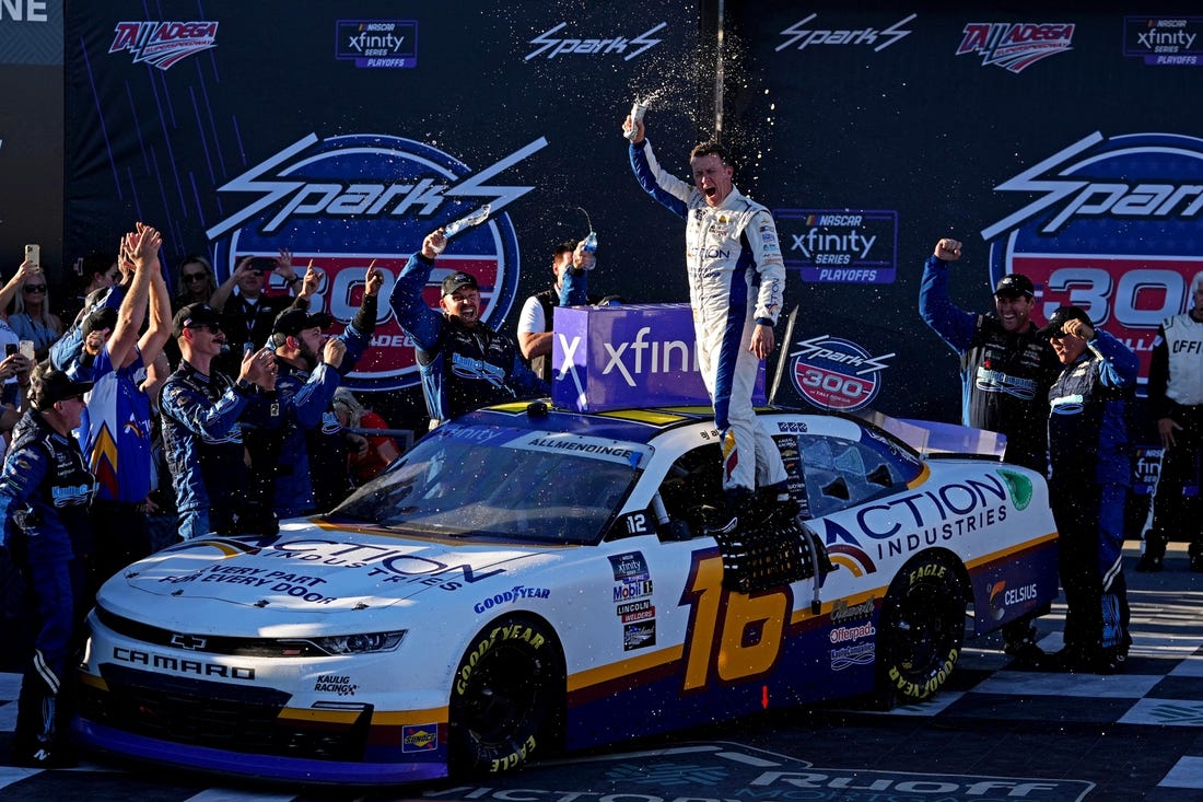 Oct 1, 2022; Talladega, Alabama, USA; NASCAR Xfinity Series driver AJ Allmendinger (16) celebrates winning the Sparks 300 at Talladega Superspeedway. Mandatory Credit: Peter Casey-USA TODAY Sports