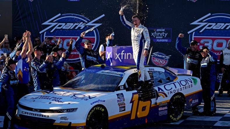 Oct 1, 2022; Talladega, Alabama, USA; NASCAR Xfinity Series driver AJ Allmendinger (16) celebrates winning the Sparks 300 at Talladega Superspeedway. Mandatory Credit: Peter Casey-USA TODAY Sports