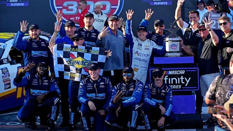 Oct 1, 2022; Talladega, Alabama, USA; NASCAR Xfinity Series driver AJ Allmendinger (16) celebrates winning the Sparks 300 at Talladega Superspeedway. Mandatory Credit: Peter Casey-USA TODAY Sports