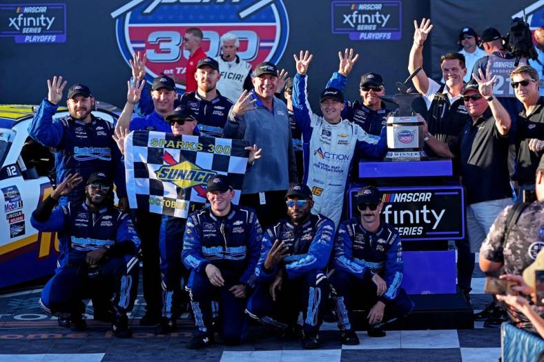 Oct 1, 2022; Talladega, Alabama, USA; NASCAR Xfinity Series driver AJ Allmendinger (16) celebrates winning the Sparks 300 at Talladega Superspeedway. Mandatory Credit: Peter Casey-USA TODAY Sports
