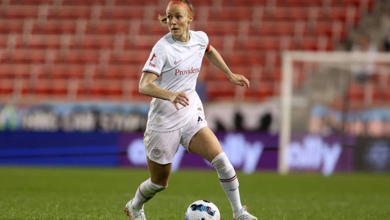 Oct 1, 2022; Harrison, New Jersey, USA; Portland Thorns FC defender Becky Sauerbrunn (4) kicks the ball against the NJ/NY Gotham FC during the second half at Red Bull Arena. Mandatory Credit: Craig Mitchelldyer-USA TODAY Sports