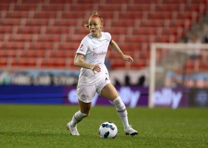 Oct 1, 2022; Harrison, New Jersey, USA; Portland Thorns FC defender Becky Sauerbrunn (4) kicks the ball against the NJ/NY Gotham FC during the second half at Red Bull Arena. Mandatory Credit: Craig Mitchelldyer-USA TODAY Sports