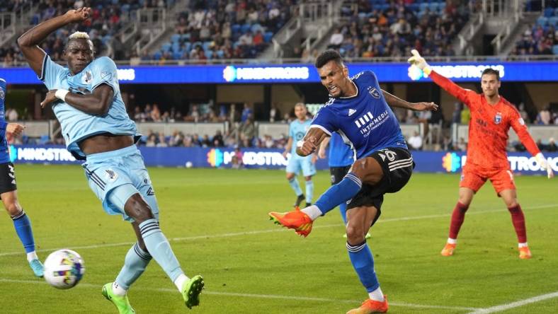 Oct 1, 2022; San Jose, California, USA; San Jose Earthquakes defender Rodrigues (26) clears the ball against Minnesota United forward Mender Garcia (28) during the first half at PayPal Park. Mandatory Credit: Darren Yamashita-USA TODAY Sports