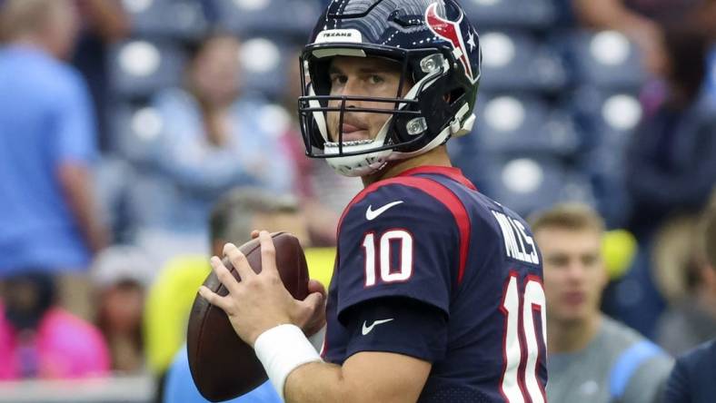 Oct 2, 2022; Houston, Texas, USA;  Houston Texans quarterback Davis Mills (10) warms up before the game against the Los Angeles Chargers at NRG Stadium. Mandatory Credit: Kevin Jairaj-USA TODAY Sports