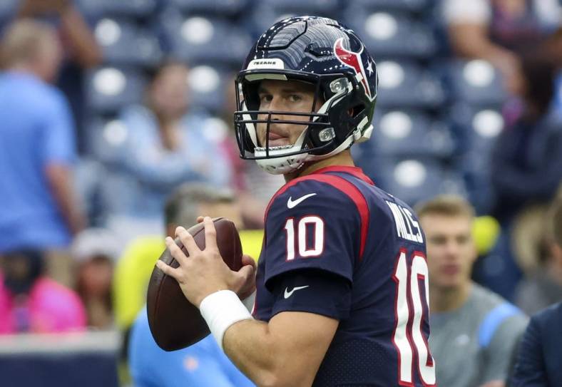 Oct 2, 2022; Houston, Texas, USA;  Houston Texans quarterback Davis Mills (10) warms up before the game against the Los Angeles Chargers at NRG Stadium. Mandatory Credit: Kevin Jairaj-USA TODAY Sports