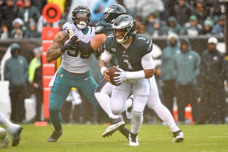 Oct 2, 2022; Philadelphia, Pennsylvania, USA; Philadelphia Eagles quarterback Jalen Hurts (1) looks for a receiver against the Jacksonville Jaguars during the first quarter at Lincoln Financial Field. Mandatory Credit: Eric Hartline-USA TODAY Sports