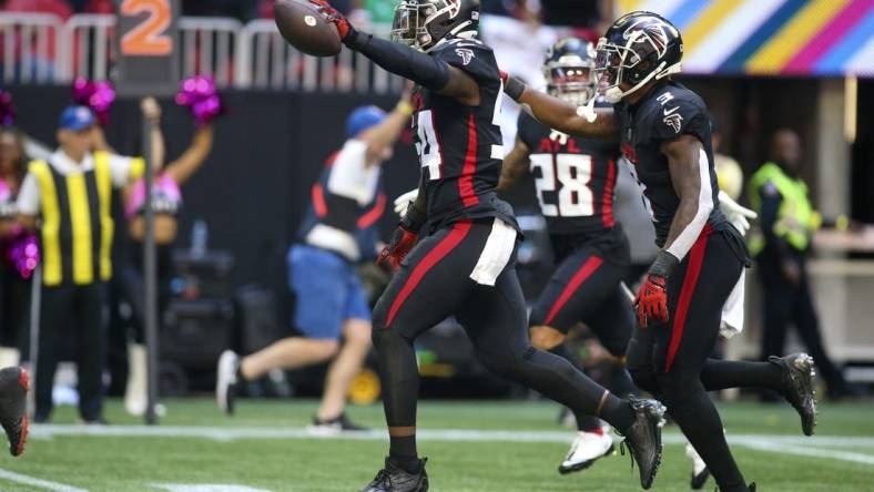 Oct 2, 2022; Atlanta, Georgia, USA; Atlanta Falcons linebacker Rashaan Evans (54) celebrates after a fumble recovery against the Cleveland Browns in the first quarter at Mercedes-Benz Stadium. Mandatory Credit: Brett Davis-USA TODAY Sports