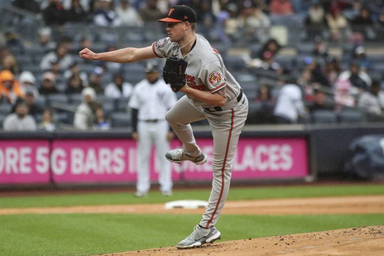 Oct 2, 2022; Bronx, New York, USA;  Baltimore Orioles starting pitcher Kyle Bradish (56) pitches in the first inning against the New York Yankees at Yankee Stadium. Mandatory Credit: Wendell Cruz-USA TODAY Sports