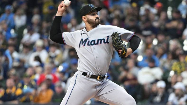 Oct 2, 2022; Milwaukee, Wisconsin, USA; Miami Marlins starting pitcher Pablo Lopez (49) delivers a pitch in the first inning against the Milwaukee Brewers at American Family Field. Mandatory Credit: Michael McLoone-USA TODAY Sports