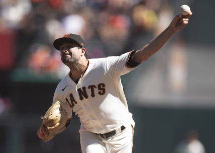 Oct 2, 2022; San Francisco, California, USA; San Francisco Giants starting pitcher Scott Alexander (54) delivers a pitch against the Arizona Diamondbacks during the first inning at Oracle Park. Mandatory Credit: D. Ross Cameron-USA TODAY Sports