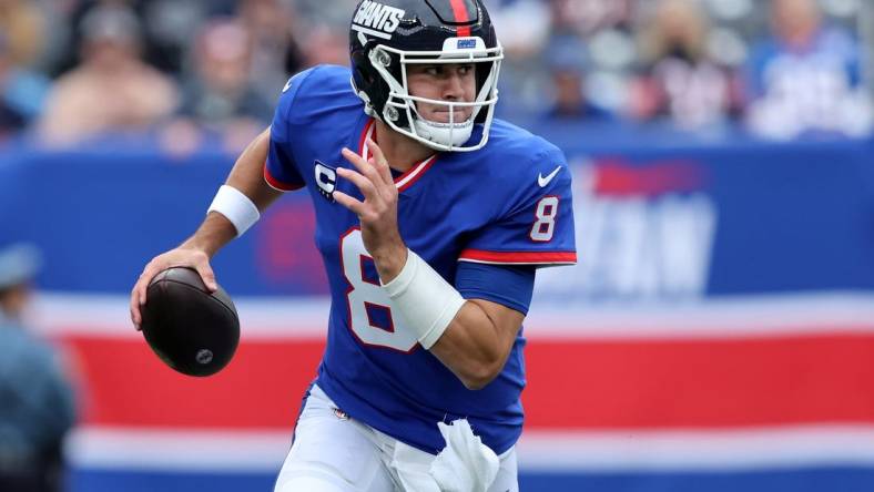 Oct 2, 2022; East Rutherford, New Jersey, USA; New York Giants quarterback Daniel Jones (8) looks to pass against the Chicago Bears during the first quarter at MetLife Stadium. Mandatory Credit: Brad Penner-USA TODAY Sports