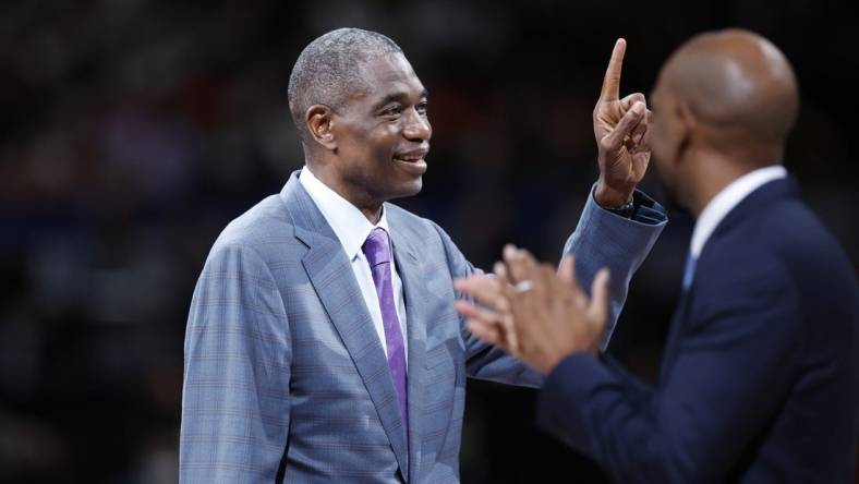 Oct 2, 2022; Saitama, JPN; Dikembe Mutombo gestures as he is introduced after the first quarter at Saitama Super Arena. Mandatory Credit: Yukihito Taguchi-USA TODAY Sports