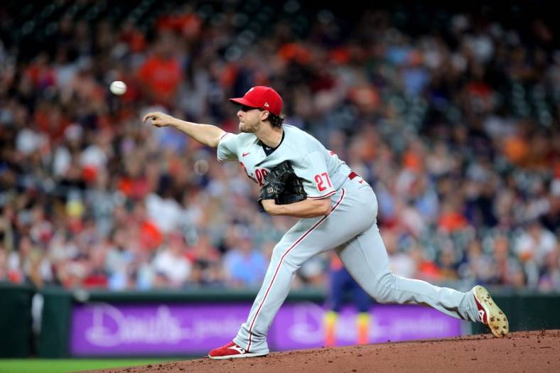 Oct 3, 2022; Houston, Texas, USA; Philadelphia Phillies starting pitcher Aaron Nola (27) delivers a pitch against the Houston Astros during the first inning at Minute Maid Park. Mandatory Credit: Erik Williams-USA TODAY Sports