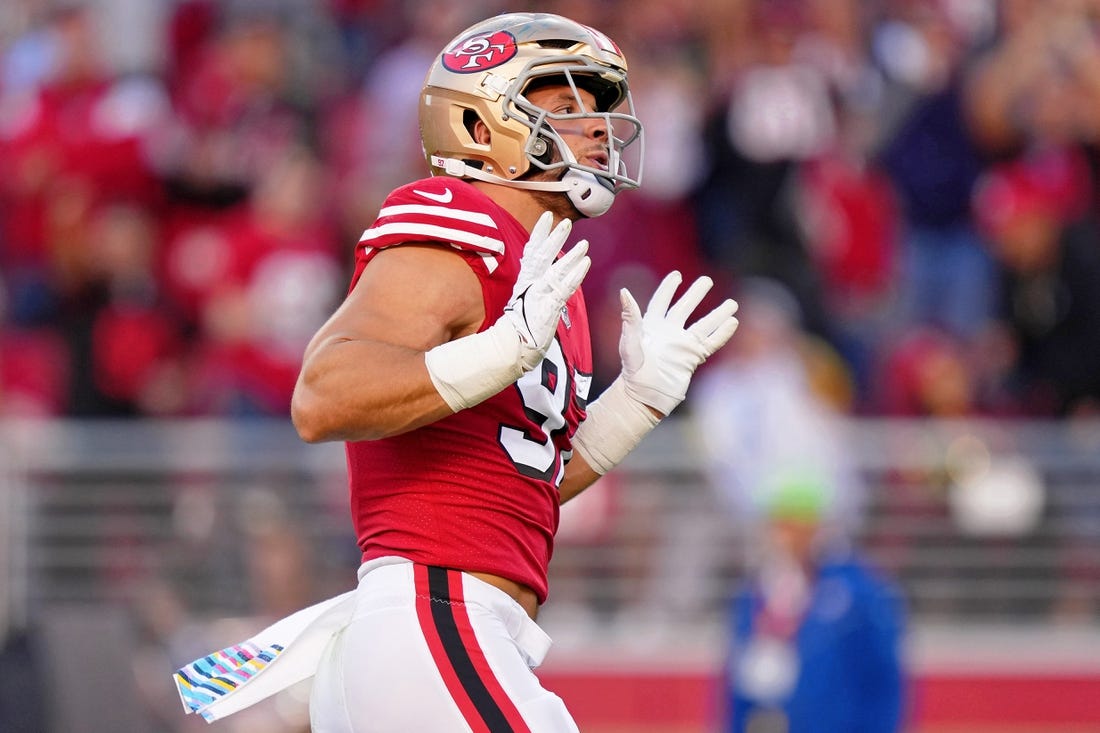 Oct 3, 2022; Santa Clara, California, USA; San Francisco 49ers defensive end Nick Bosa (97) reacts after making a sack against the Los Angeles Rams during the first quarter at Levi's Stadium. Mandatory Credit: Kyle Terada-USA TODAY Sports