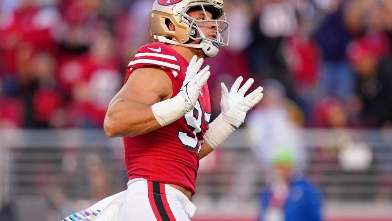 Oct 3, 2022; Santa Clara, California, USA; San Francisco 49ers defensive end Nick Bosa (97) reacts after making a sack against the Los Angeles Rams during the first quarter at Levi's Stadium. Mandatory Credit: Kyle Terada-USA TODAY Sports