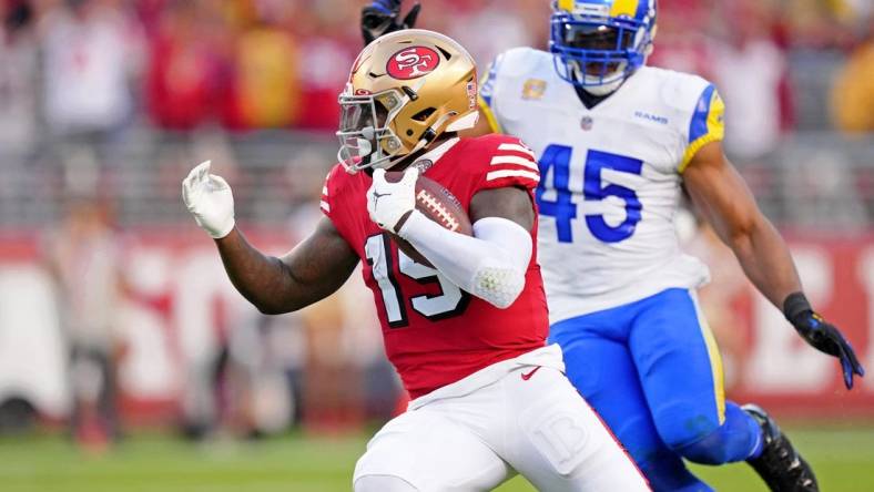 Oct 3, 2022; Santa Clara, California, USA; San Francisco 49ers wide receiver Deebo Samuel (19) runs with the ball against the Los Angeles Rams during the second quarter at Levi's Stadium. Mandatory Credit: Kyle Terada-USA TODAY Sports