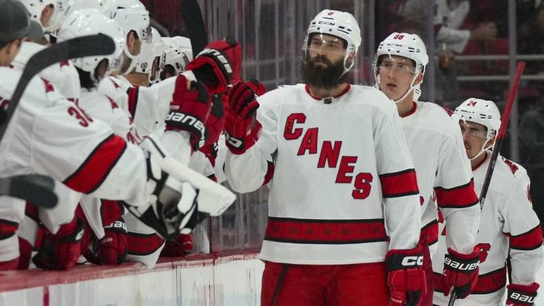 Oct 3, 2022; Raleigh, North Carolina, USA;  Carolina Hurricanes defenseman Brent Burns (8) celebrates his goal against the Columbus Blue Jackets during the second period at PNC Arena. Mandatory Credit: James Guillory-USA TODAY Sports