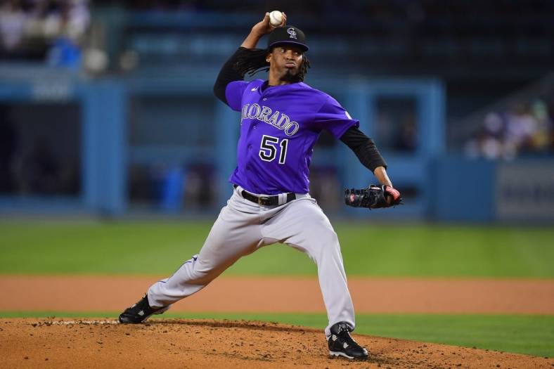 October 3, 2022; Los Angeles, California, USA; Colorado Rockies starting pitcher Jose Urena (51) throws against the Los Angeles Dodgers during the second inning at Dodger Stadium. Mandatory Credit: Gary A. Vasquez-USA TODAY Sports