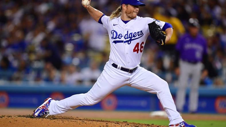 October 3, 2022; Los Angeles, California, USA; Los Angeles Dodgers relief pitcher Craig Kimbrel (46) throws against the Colorado Rockies during the fifth inning at Dodger Stadium. Mandatory Credit: Gary A. Vasquez-USA TODAY Sports