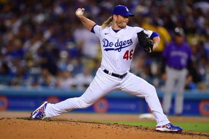 October 3, 2022; Los Angeles, California, USA; Los Angeles Dodgers relief pitcher Craig Kimbrel (46) throws against the Colorado Rockies during the fifth inning at Dodger Stadium. Mandatory Credit: Gary A. Vasquez-USA TODAY Sports