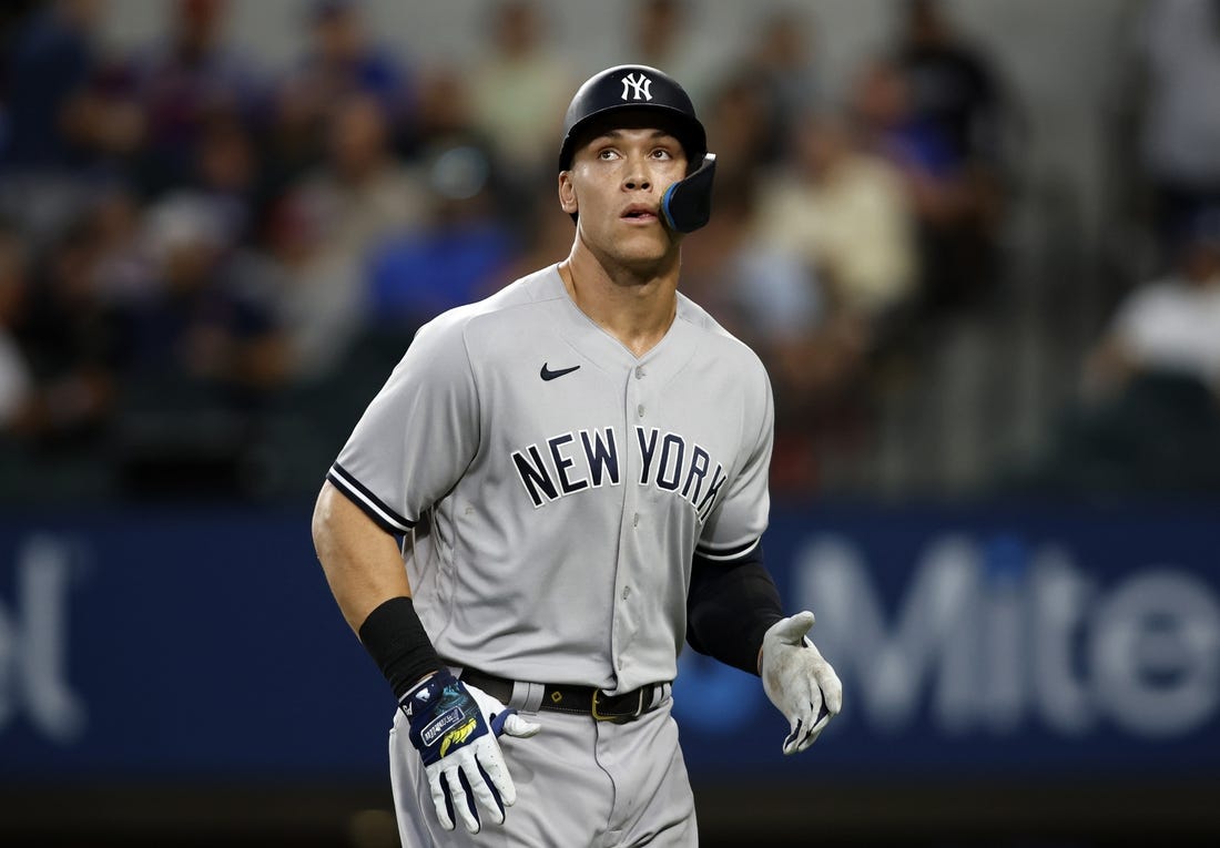 Oct 4, 2022; Arlington, Texas, USA;  New York Yankees designated hitter Aaron Judge (99) watches a replay of his pop out in the fifth inning against the Texas Rangers at Globe Life Field. Mandatory Credit: Tim Heitman-USA TODAY Sports