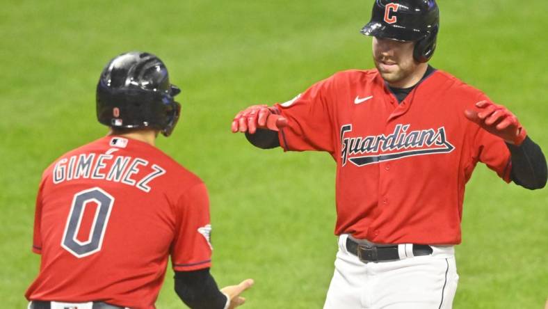 Oct 4, 2022; Cleveland, Ohio, USA; Cleveland Guardians first baseman Owen Miller (6) celebrates his two-run home run with second baseman Andres Gimenez (0) in the fifth inning against the Kansas City Royals at Progressive Field. Mandatory Credit: David Richard-USA TODAY Sports