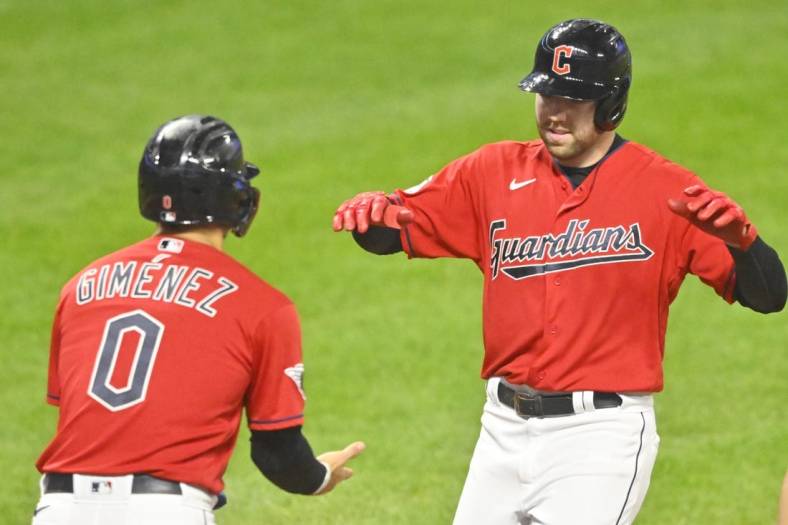 Oct 4, 2022; Cleveland, Ohio, USA; Cleveland Guardians first baseman Owen Miller (6) celebrates his two-run home run with second baseman Andres Gimenez (0) in the fifth inning against the Kansas City Royals at Progressive Field. Mandatory Credit: David Richard-USA TODAY Sports