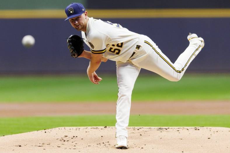 Oct 4, 2022; Milwaukee, Wisconsin, USA;  Milwaukee Brewers pitcher Eric Lauer (52) throws a pitch during the first inning against the Arizona Diamondbacks at American Family Field. Mandatory Credit: Jeff Hanisch-USA TODAY Sports