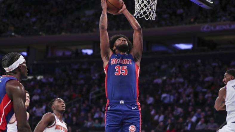 Oct 4, 2022; New York, New York, USA;  Detroit Pistons forward Marvin Bagley III (35) goes up for a dunk in the second quarter against the New York Knicks at Madison Square Garden. Mandatory Credit: Wendell Cruz-USA TODAY Sports