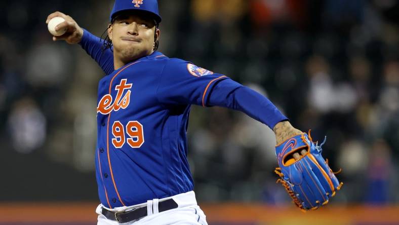 Oct 4, 2022; New York City, New York, USA; New York Mets starting pitcher Taijuan Walker (99) pitches against the Washington Nationals during the first inning at Citi Field. Mandatory Credit: Brad Penner-USA TODAY Sports