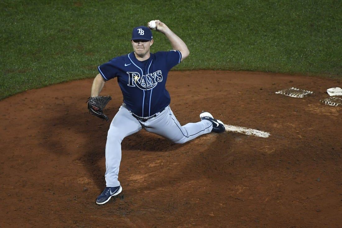 Oct 4, 2022; Boston, Massachusetts, USA; Tampa Bay Rays relief pitcher Colin Poche (38) pitches during the fifth inning against the Boston Red Sox at Fenway Park. Mandatory Credit: Bob DeChiara-USA TODAY Sports