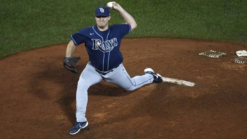 Oct 4, 2022; Boston, Massachusetts, USA; Tampa Bay Rays relief pitcher Colin Poche (38) pitches during the fifth inning against the Boston Red Sox at Fenway Park. Mandatory Credit: Bob DeChiara-USA TODAY Sports