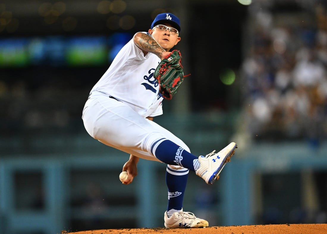 Oct 4, 2022; Los Angeles, California, USA;  Los Angeles Dodgers starting pitcher Julio Urias (7) throws to the plate in the first inning against the Colorado Rockies at Dodger Stadium. Mandatory Credit: Jayne Kamin-Oncea-USA TODAY Sports