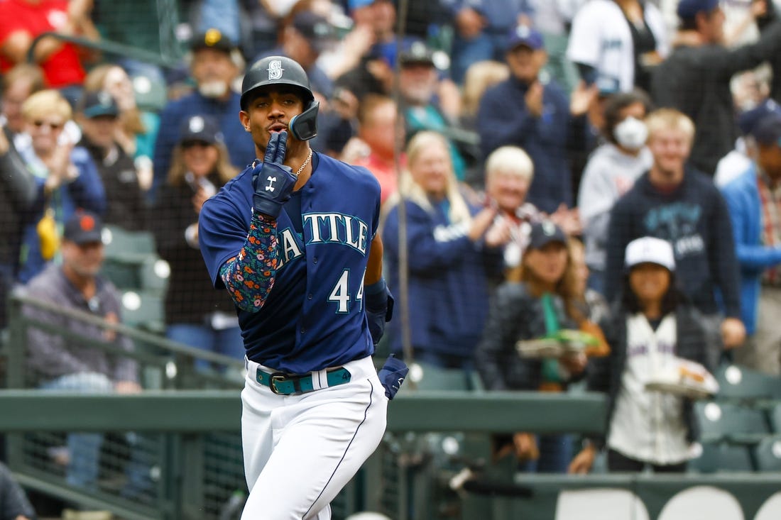 Oct 5, 2022; Seattle, Washington, USA; Seattle Mariners center fielder Julio Rodriguez (44) celebrates while running the bases after hitting a solo-home run against the Detroit Tigers during the first inning at T-Mobile Park. Mandatory Credit: Joe Nicholson-USA TODAY Sports