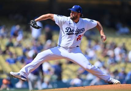 Oct 5, 2022; Los Angeles, California, USA;  Los Angeles Dodgers starting pitcher Clayton Kershaw (22) throws to the plate in the first inning against the Colorado Rockies at Dodger Stadium. Mandatory Credit: Jayne Kamin-Oncea-USA TODAY Sports
