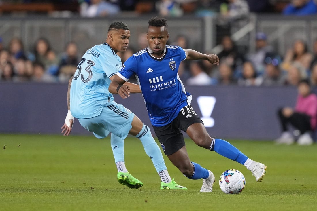 Oct 1, 2022; San Jose, California, USA; San Jose Earthquakes forward Jeremy Ebobisse (11) dribbles against Minnesota United midfielder Kervin Arriaga (33) during the first half at PayPal Park. Mandatory Credit: Darren Yamashita-USA TODAY Sports