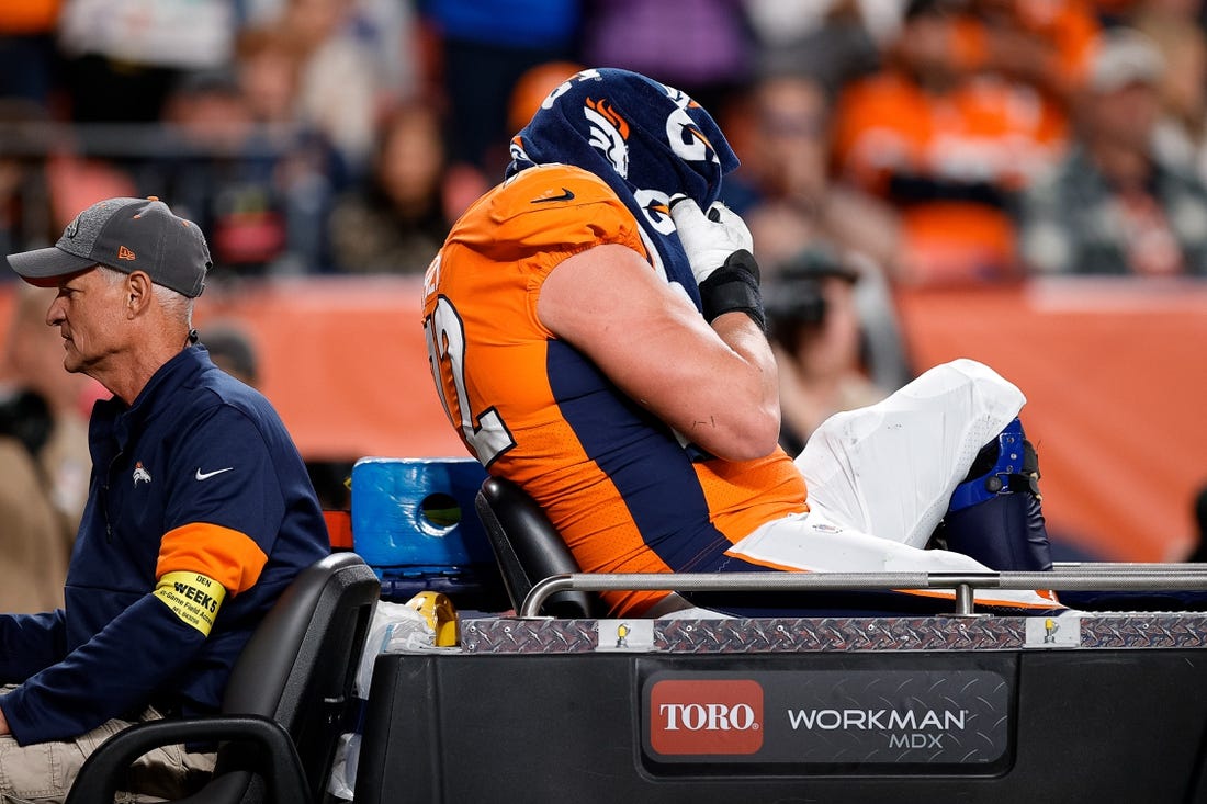 Oct 6, 2022; Denver, Colorado, USA; Denver Broncos offensive tackle Garett Bolles (72) is carted off the field in the fourth quarter against the Indianapolis Colts at Empower Field at Mile High. Mandatory Credit: Isaiah J. Downing-USA TODAY Sports
