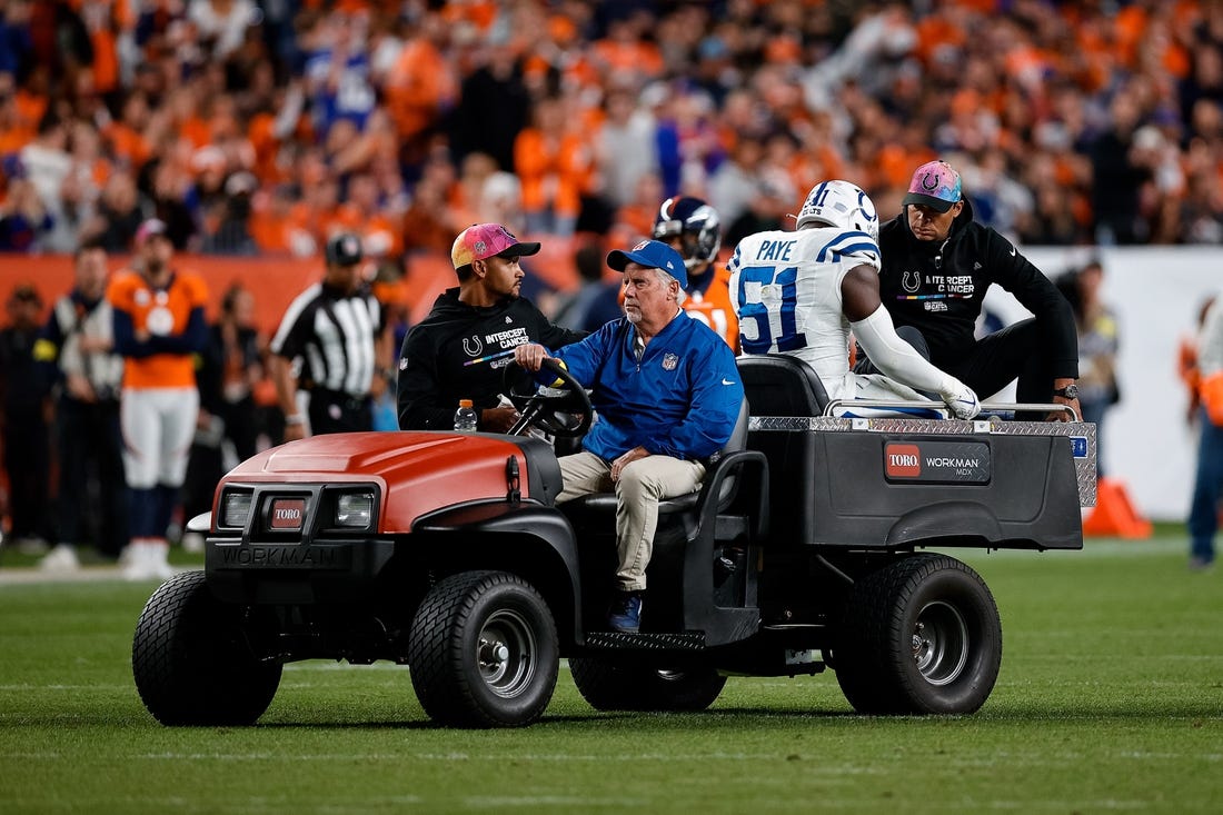 Oct 6, 2022; Denver, Colorado, USA; Indianapolis Colts defensive end Kwity Paye (51) is carted off the field in the fourth quarter against the Denver Broncos at Empower Field at Mile High. Mandatory Credit: Isaiah J. Downing-USA TODAY Sports