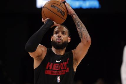 Oct 7, 2022; Memphis, Tennessee, USA; Miami Heat forward Caleb Martin (16) shoots prior to the game against the Memphis Grizzlies at FedExForum. Mandatory Credit: Petre Thomas-USA TODAY Sports