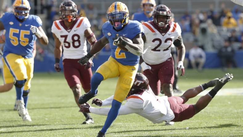 Oct 8, 2022; Pittsburgh, Pennsylvania, USA;  Pittsburgh Panthers running back Israel Abanikanda (2) runs to score a touchdown against the Virginia Tech Hokies during the first quarter at Acrisure Stadium. Mandatory Credit: Charles LeClaire-USA TODAY Sports