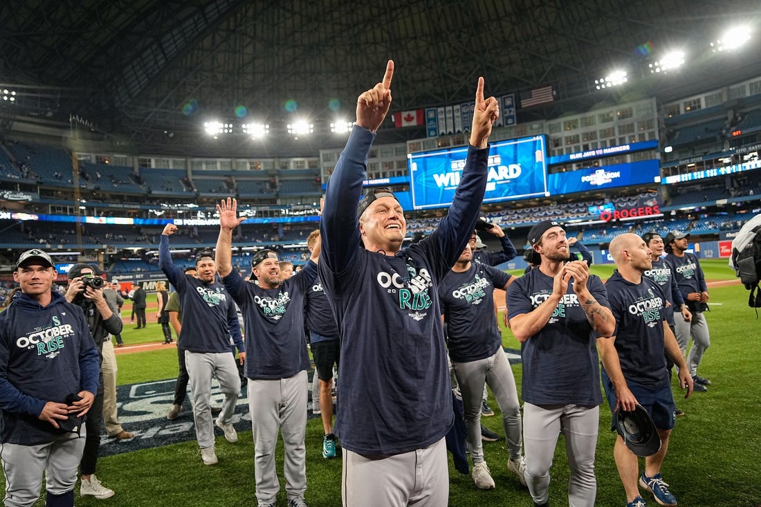 Oct 8, 2022; Toronto, Ontario, CAN; Seattle Mariners relief pitcher Paul Sewald (37) celebrates after the game against the Toronto Blue Jays in game two of the Wild Card series for the 2022 MLB Playoffs at Rogers Centre. Mandatory Credit: John E. Sokolowski-USA TODAY Sports