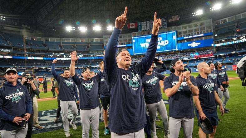 Oct 8, 2022; Toronto, Ontario, CAN; Seattle Mariners relief pitcher Paul Sewald (37) celebrates after the game against the Toronto Blue Jays in game two of the Wild Card series for the 2022 MLB Playoffs at Rogers Centre. Mandatory Credit: John E. Sokolowski-USA TODAY Sports