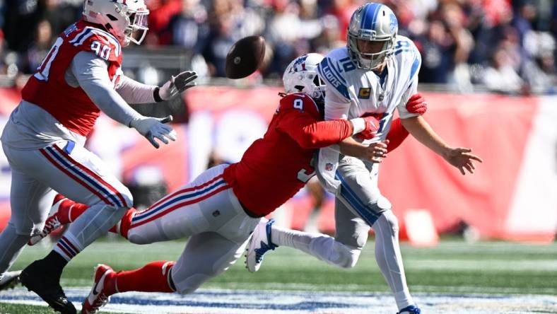 Oct 9, 2022; Foxborough, Massachusetts, USA; New England Patriots linebacker Matthew Judon (9) strip sacks Detroit Lions quarterback Jared Goff (16) during the first half at Gillette Stadium. Mandatory Credit: Brian Fluharty-USA TODAY Sports