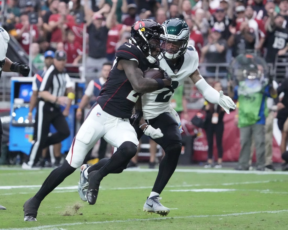 Oct 9, 2022; Glendale, Arizona, U.S.;  Arizona Cardinals wide receiver Marquise Brown (2) runs for a touchdown after a catch against Philadelphia Eagles cornerback Darius Slay (2) during the second quarter at State Farm Stadium. Mandatory Credit: Michael Chow-USA TODAY Sports