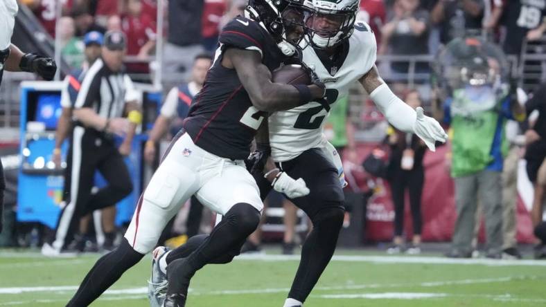 Oct 9, 2022; Glendale, Arizona, U.S.;  Arizona Cardinals wide receiver Marquise Brown (2) runs for a touchdown after a catch against Philadelphia Eagles cornerback Darius Slay (2) during the second quarter at State Farm Stadium. Mandatory Credit: Michael Chow-USA TODAY Sports