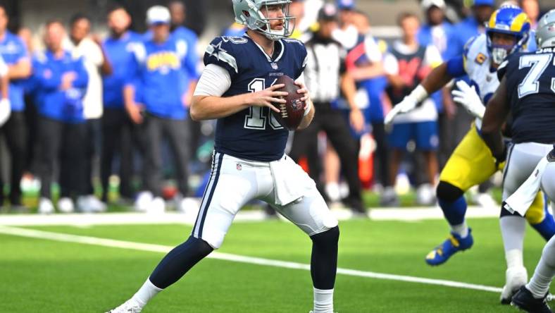 Oct 9, 2022; Inglewood, California, USA; Dallas Cowboys quarterback Cooper Rush (10) sets to pass in the first half against the Los Angeles Rams at SoFi Stadium. Mandatory Credit: Jayne Kamin-Oncea-USA TODAY Sports