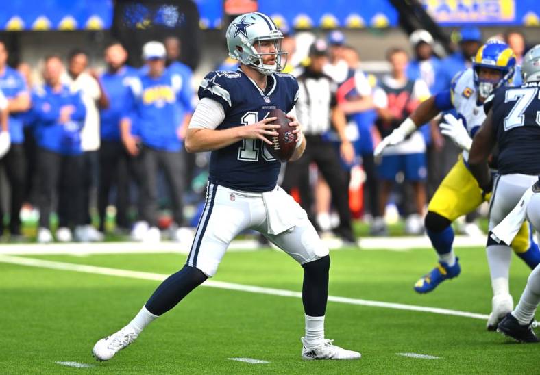 Oct 9, 2022; Inglewood, California, USA; Dallas Cowboys quarterback Cooper Rush (10) sets to pass in the first half against the Los Angeles Rams at SoFi Stadium. Mandatory Credit: Jayne Kamin-Oncea-USA TODAY Sports