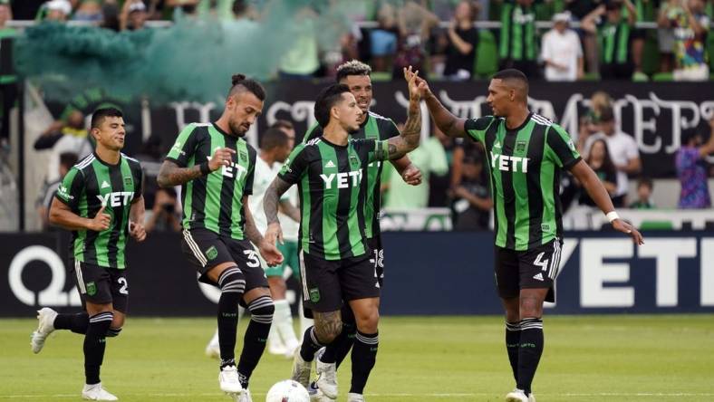 Oct 9, 2022; Austin, Texas, USA; Austin FC forward Sebasti  n Driussi (7) celebrates scoring a goal with teammates during the second half against the Colorado Rapids at Q2 Stadium. Mandatory Credit: Scott Wachter-USA TODAY Sports