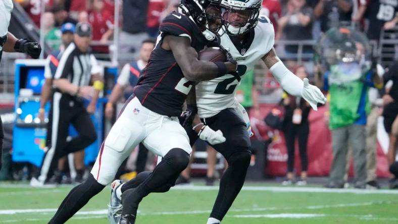 Oct 9, 2022; Glendale, Arizona, U.S.;  Arizona Cardinals wide receiver Marquise Brown (2) runs for a touchdown after a catch against Philadelphia Eagles cornerback Darius Slay (2) during the second quarter at State Farm Stadium.

Nfl Eagles At Cardinals